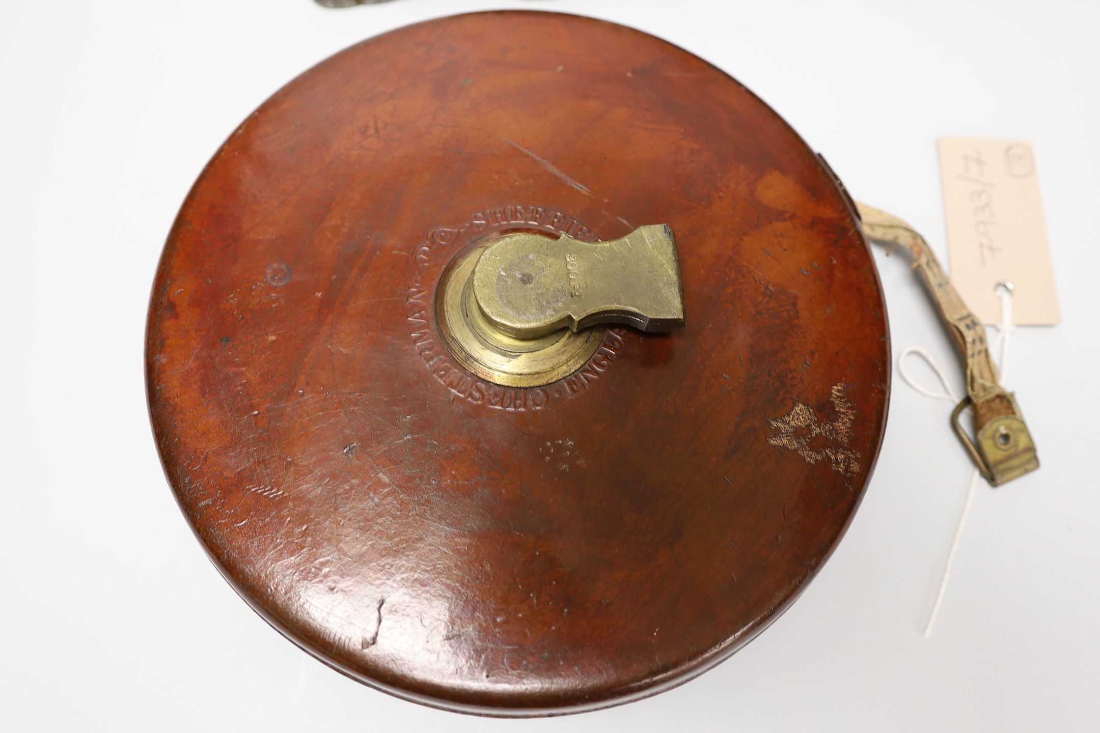 A late Georgian Marratt & Short Improved Chondrometer, a large surveyor's measure and a cast iron protractor